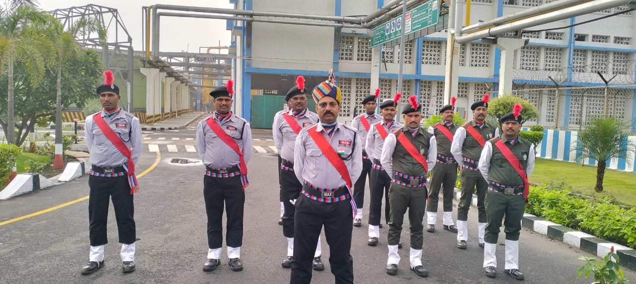 Uniformed Max Vigil squad in formal parade stance